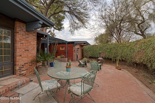 view of patio with outdoor dining area