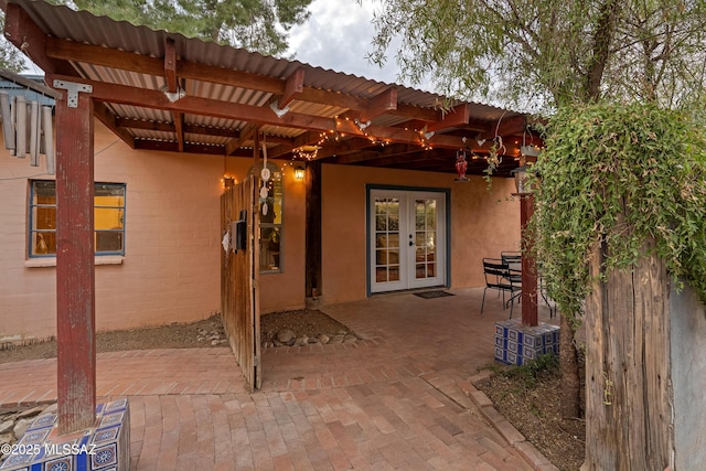 view of patio featuring french doors