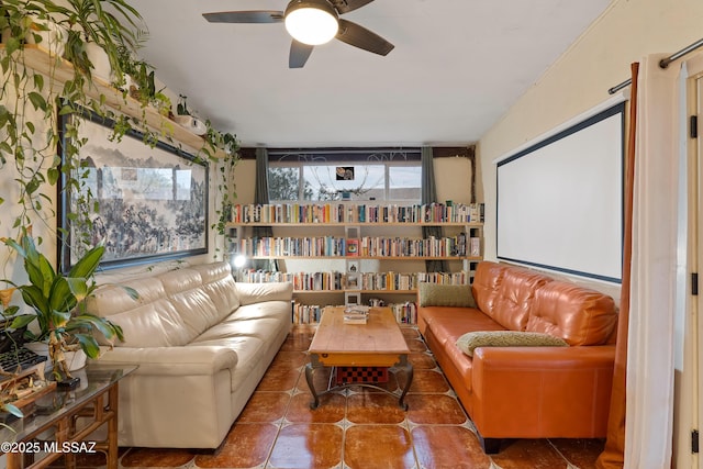 interior space with tile patterned flooring and a ceiling fan