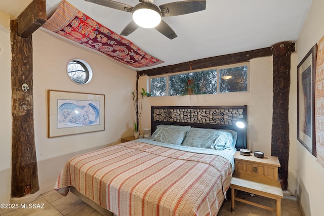 bedroom featuring ceiling fan and tile patterned flooring