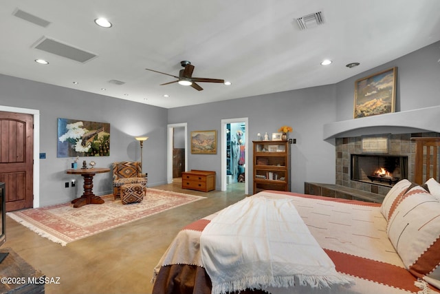 bedroom featuring recessed lighting, visible vents, and a fireplace