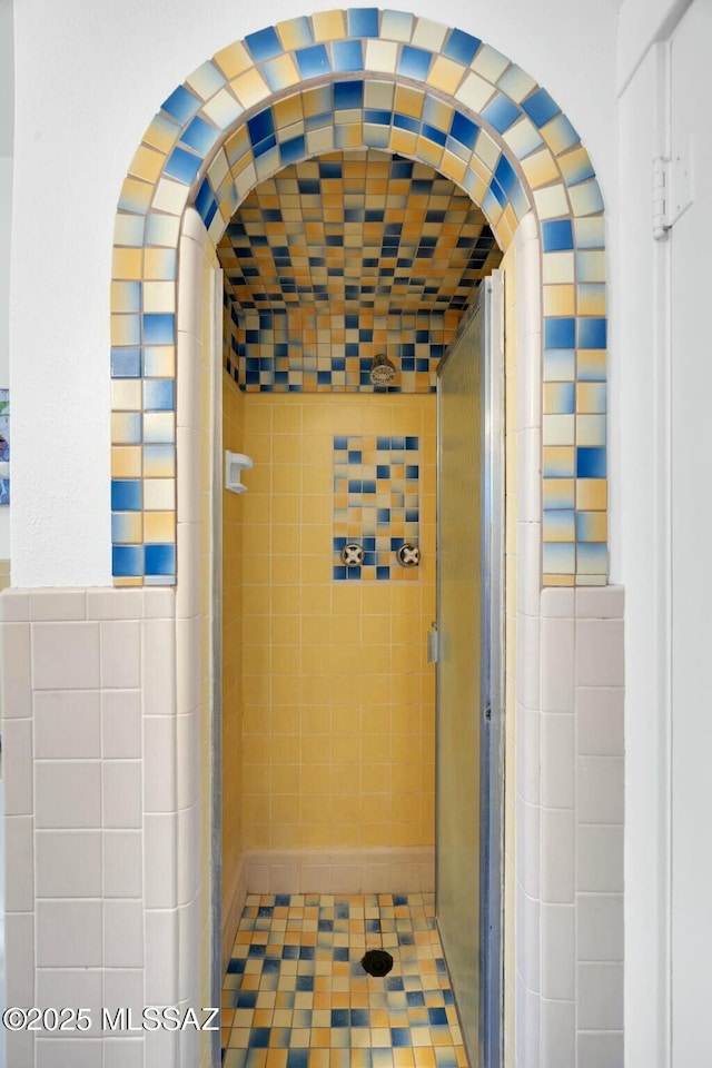 interior space featuring tile walls