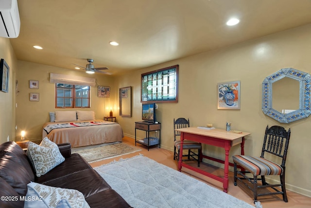 bedroom featuring baseboards, an AC wall unit, and recessed lighting