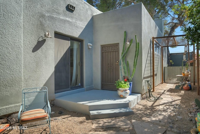 exterior space with stucco siding