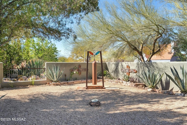 view of yard featuring fence