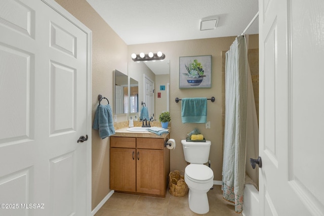 bathroom with tile patterned flooring, toilet, a shower with shower curtain, vanity, and baseboards