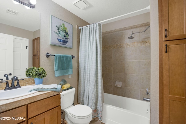 full bath with shower / bath combo, visible vents, a textured wall, toilet, and vanity