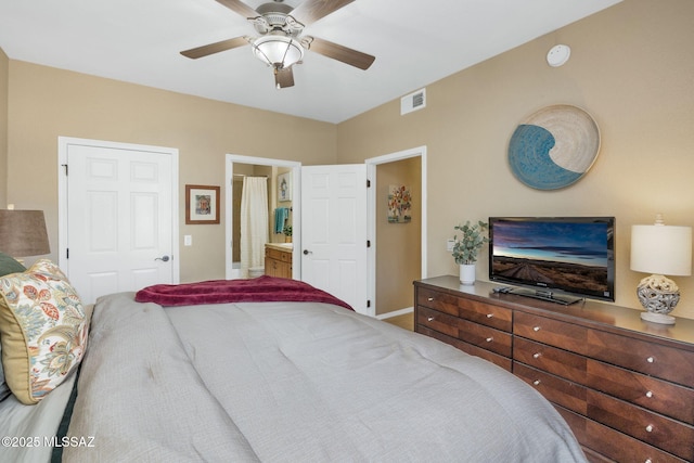 bedroom featuring connected bathroom, visible vents, and a ceiling fan