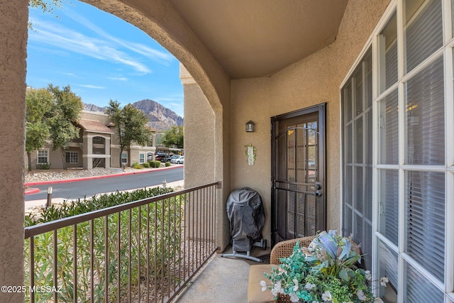 balcony featuring a grill and a mountain view