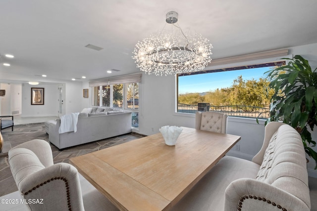 dining room with recessed lighting, visible vents, and an inviting chandelier