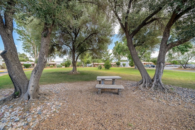 surrounding community featuring a lawn