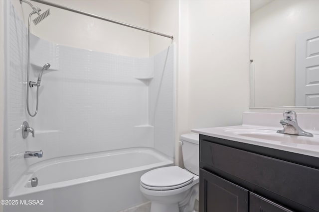 bathroom with toilet, washtub / shower combination, and vanity