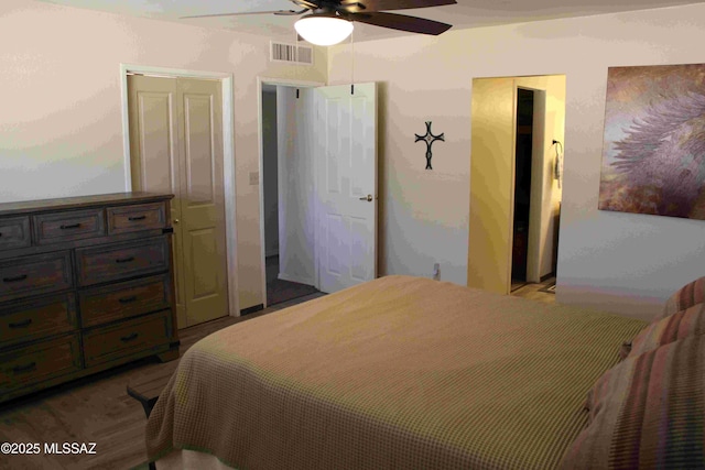 bedroom with visible vents and ceiling fan