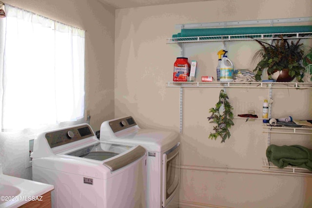 laundry area with laundry area and washer and dryer