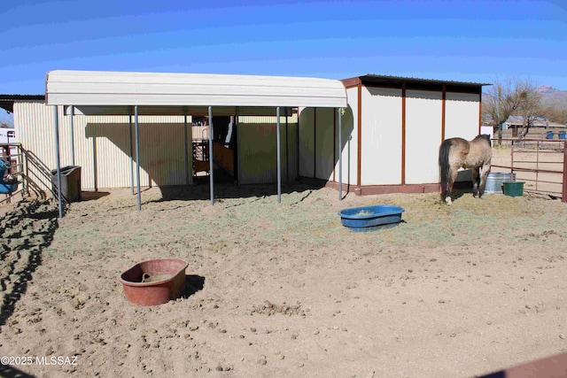 view of outbuilding with an outdoor structure and an exterior structure