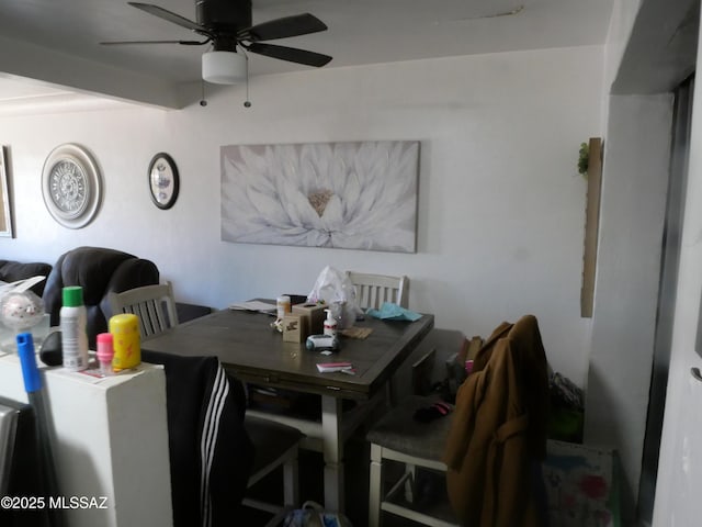 dining room featuring ceiling fan