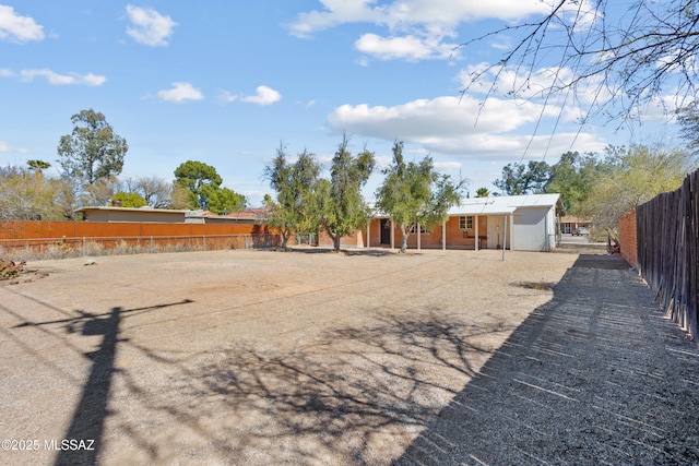 view of yard featuring fence