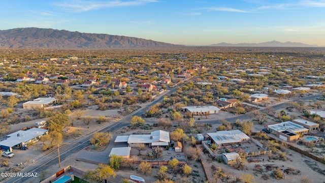 birds eye view of property featuring a mountain view