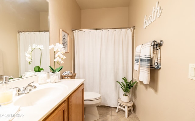 bathroom featuring vanity, curtained shower, tile patterned flooring, and toilet