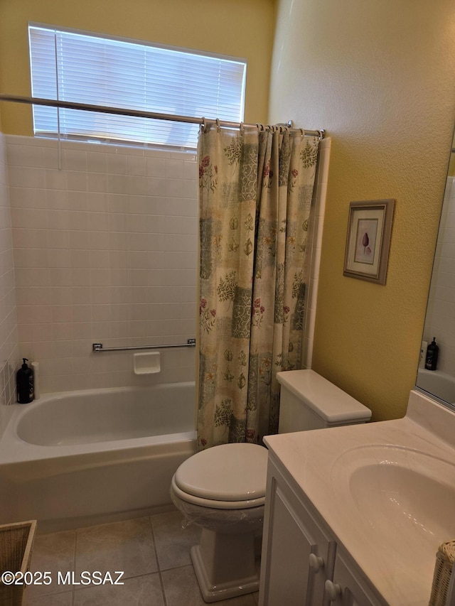 bathroom with tile patterned flooring, shower / tub combo with curtain, vanity, and toilet