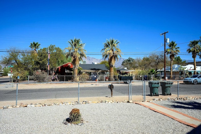 view of street featuring a gate