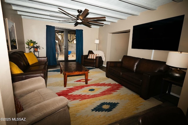 living room with a ceiling fan, french doors, and beam ceiling