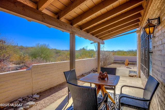 view of patio with fence