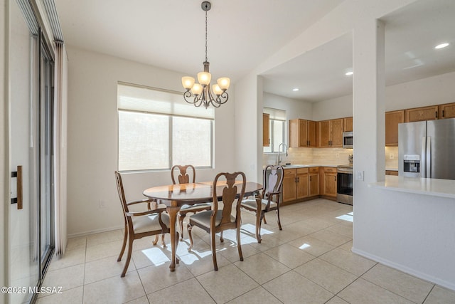 dining space featuring recessed lighting, light tile patterned floors, baseboards, and an inviting chandelier