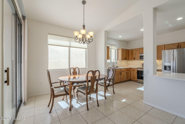 4751 S Longmore Dr, Green Valley, AZ 85622 - dining room featuring light tile patterned floors, baseboards, recessed lighting, and an inviting chandelier