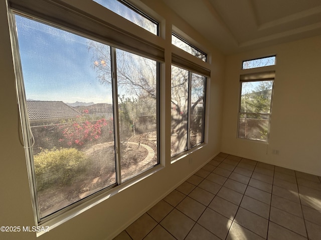 unfurnished sunroom featuring plenty of natural light