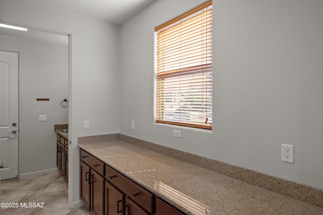 interior space featuring light stone countertops