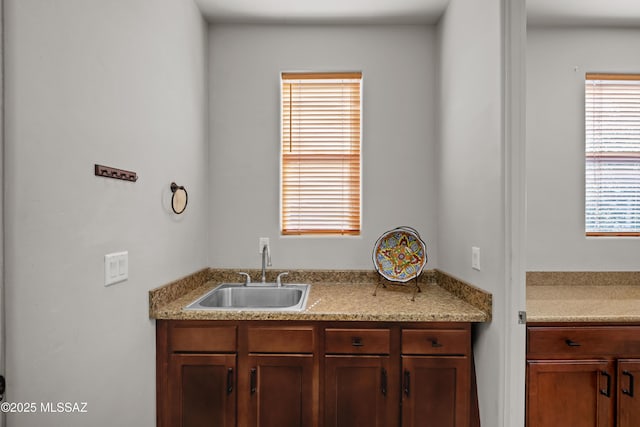 kitchen with light countertops and a sink