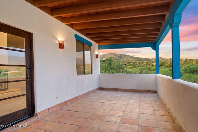 balcony featuring a mountain view