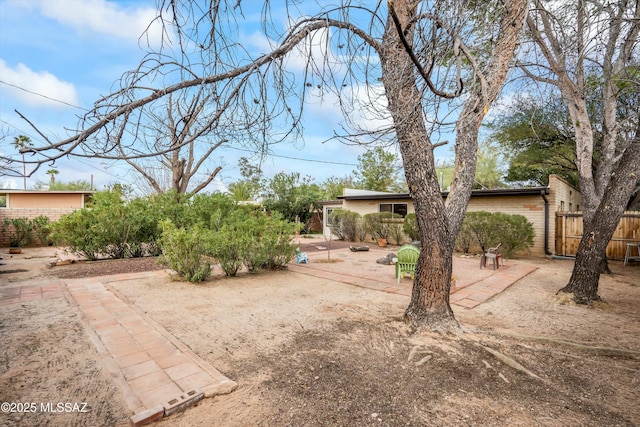 view of yard with a patio area and fence