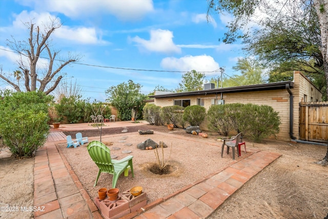 view of patio / terrace featuring fence