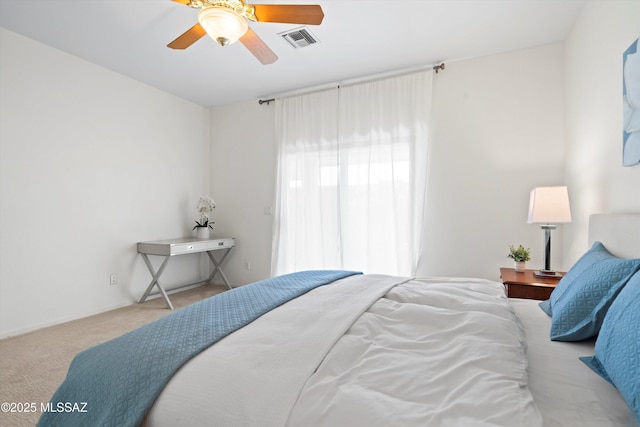 bedroom featuring carpet flooring, visible vents, and a ceiling fan