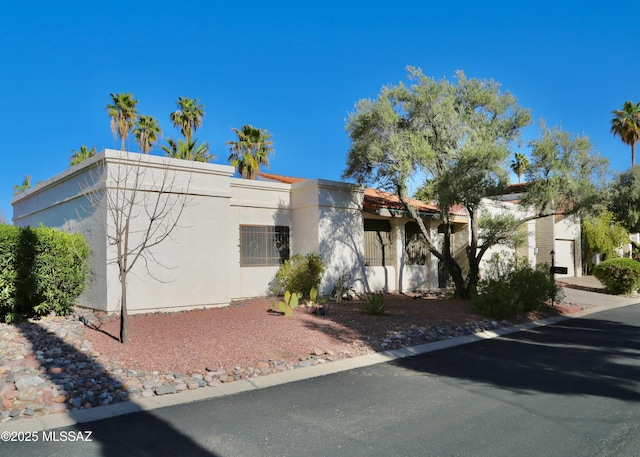 view of front of home with stucco siding