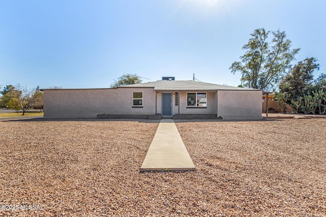 single story home with stucco siding