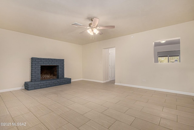 4510 E 6th St, Tucson, AZ 85711 - unfurnished living room featuring ceiling fan, baseboards, and a fireplace