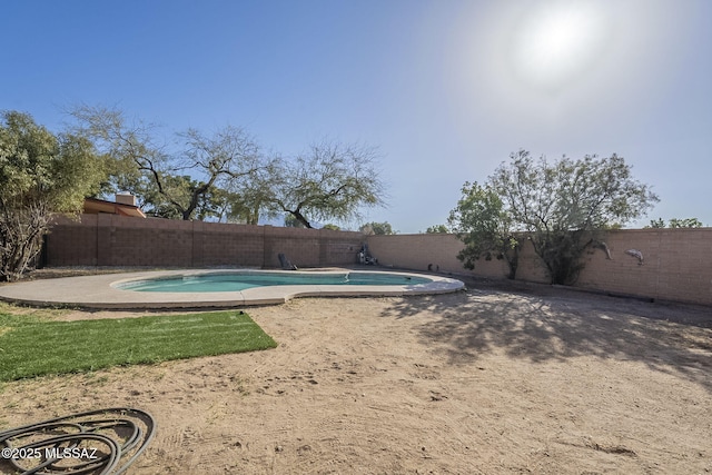 view of swimming pool featuring a fenced in pool and a fenced backyard