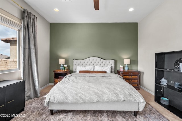 bedroom featuring visible vents, carpet, a ceiling fan, and baseboards