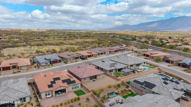 bird's eye view with a mountain view and a residential view