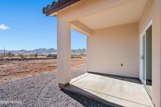 view of patio featuring a mountain view