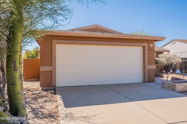 detached garage with fence