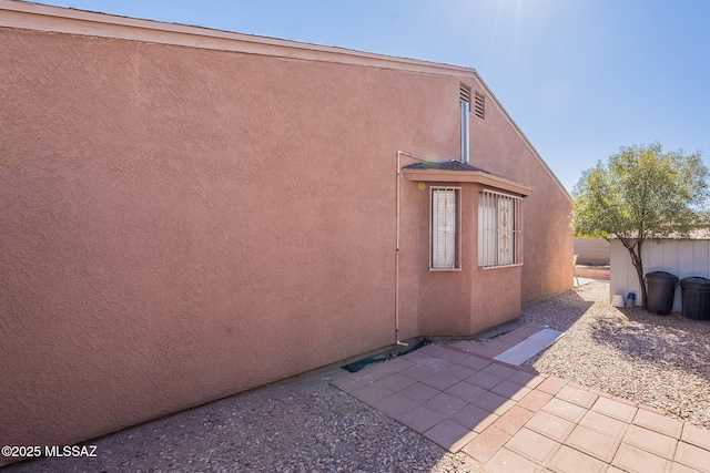 view of property exterior featuring a patio area and stucco siding