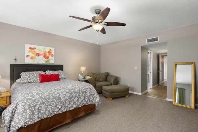 carpeted bedroom featuring baseboards, visible vents, and ceiling fan