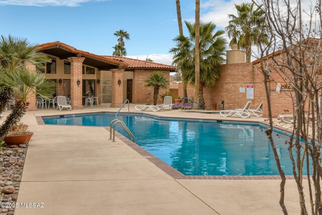 pool featuring a patio