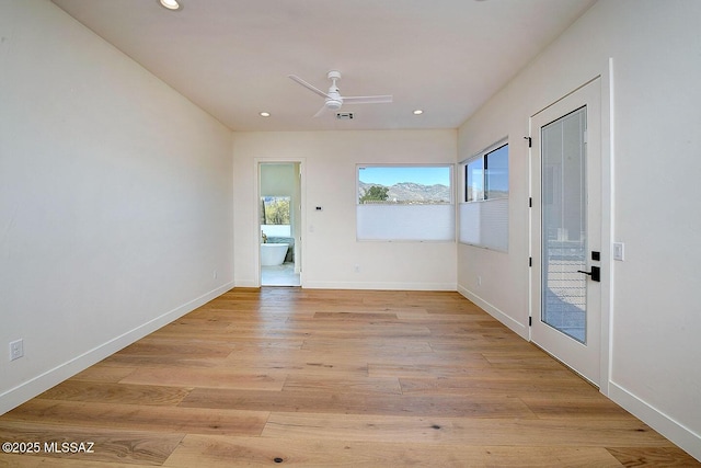 empty room featuring ceiling fan, recessed lighting, visible vents, baseboards, and light wood-style floors