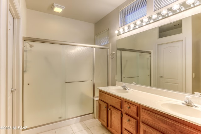 13755 N Buster Spring Way, Oro Valley, AZ 85755 - bathroom featuring a stall shower, double vanity, and tile patterned floors
