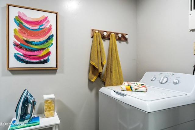 laundry area featuring washer / clothes dryer and laundry area